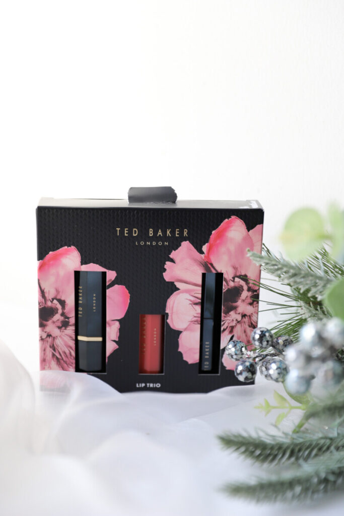 Add a touch of elegance to your beauty routine with this luxurious Ted Baker Lip Trio. Featuring a selection of perfectly curated pink hues, this set is ideal for achieving a flawless lip look. Beautifully packaged, it makes a thoughtful gift for any makeup lover this holiday season.